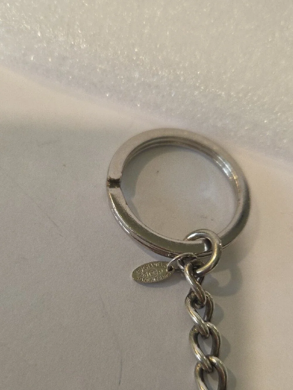 CHANEL Silver-Tone Metal Book Charm Keyring Vintage